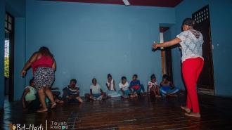 person,indoor,standing,woman,table,child,young,girl,man,court,holding,room,playing,game,walking,jumping,air,board,ball,riding,beach