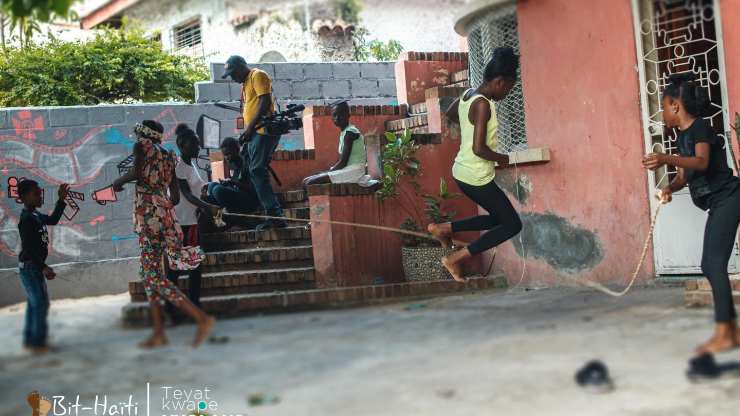 a group of people walking down the street