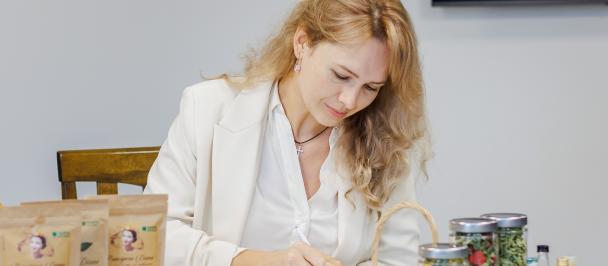 a woman sitting at a table