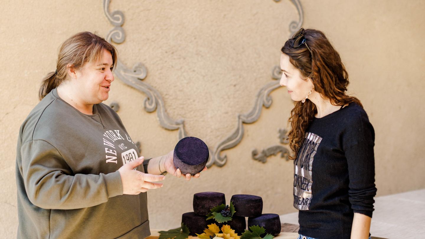 woman selling cheese