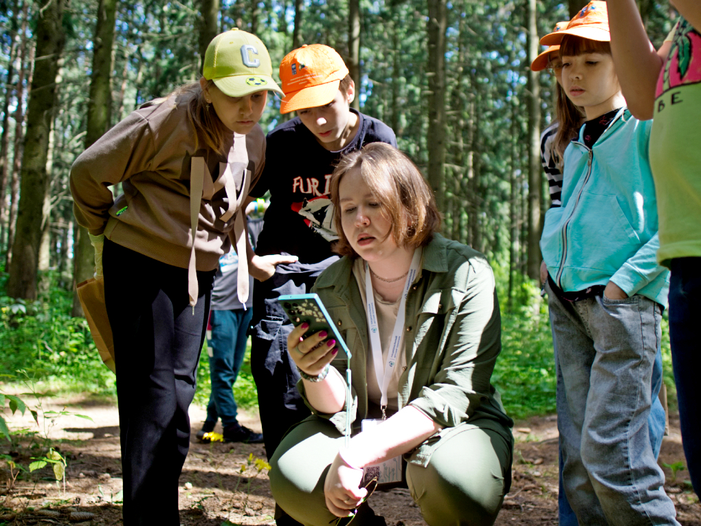 a group of people standing in a park