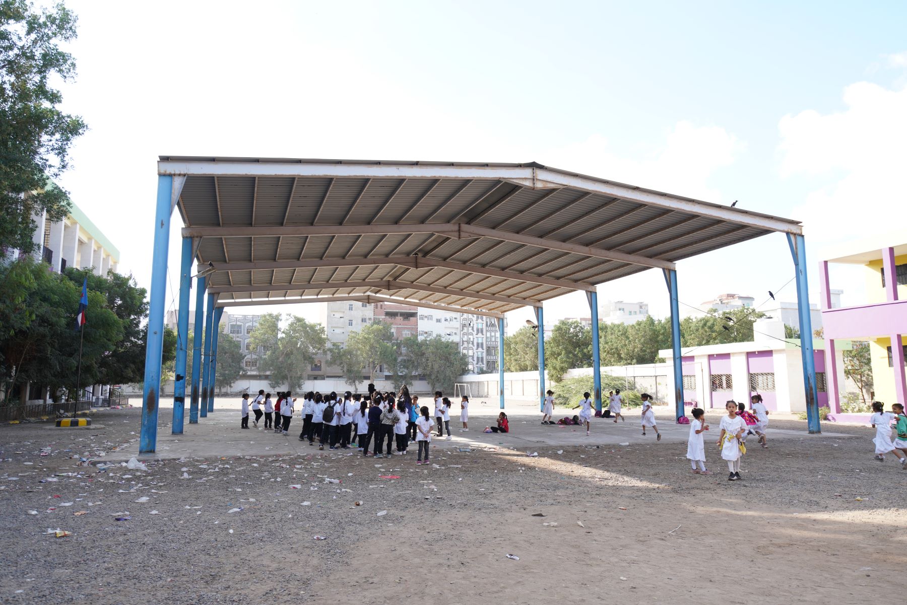 a group of people standing in front of a building