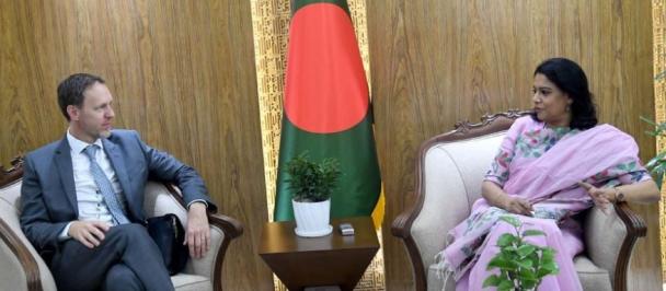 a man and a woman sitting on a chair