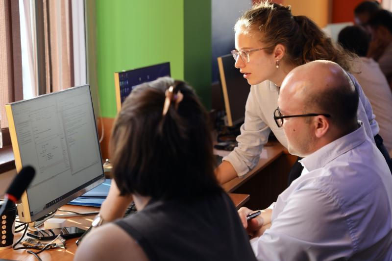 people in front of computer